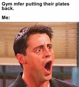 Gym mfer putting their plates back.  me