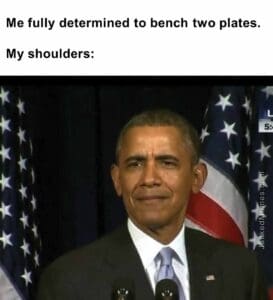 Me fully determined to bench two plates.  my shoulders