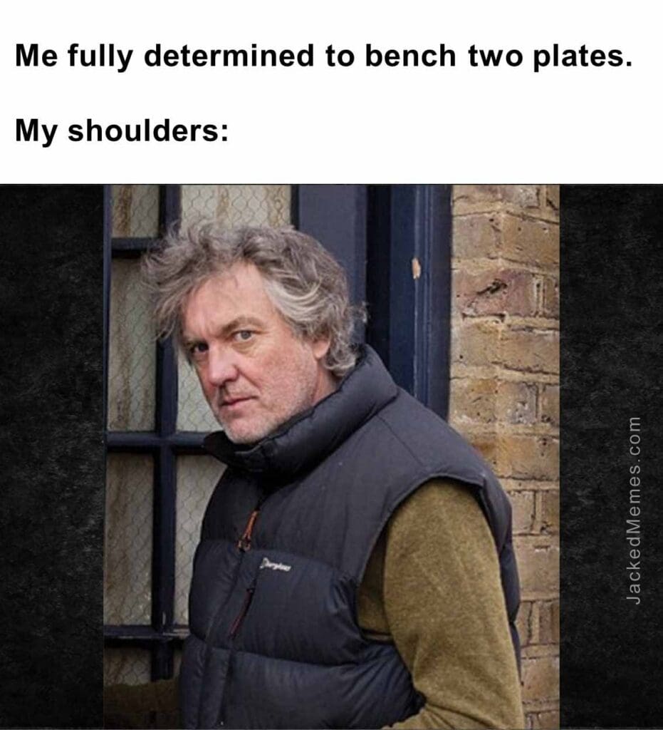 Me fully determined to bench two plates.  my shoulders