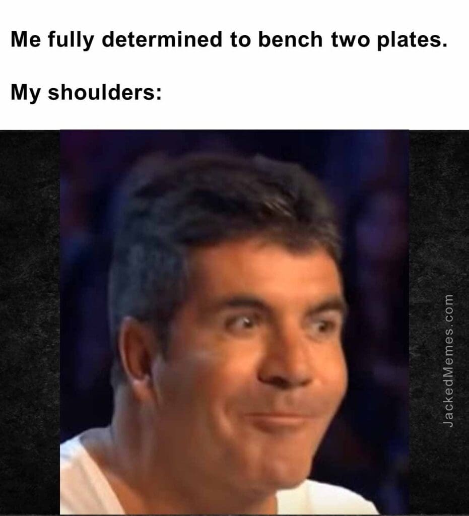 Me fully determined to bench two plates.  my shoulders